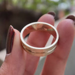 Plain yellow gold comfort fit wedding band with polished center groove video