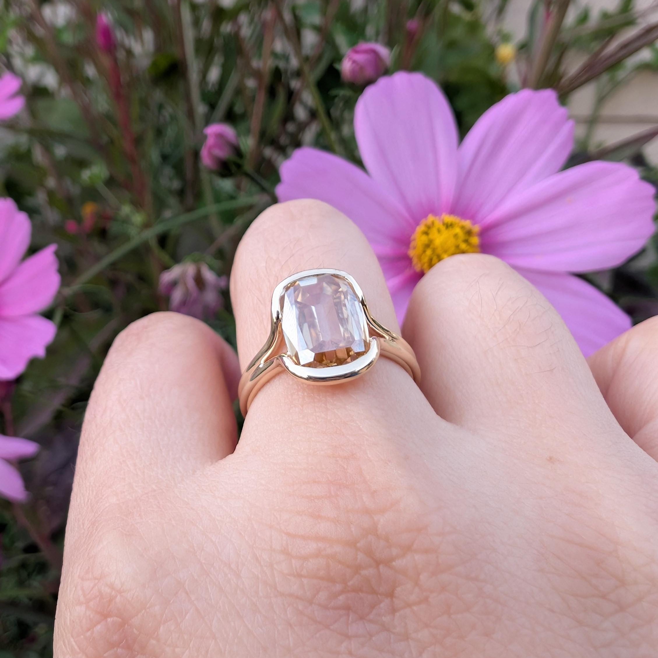 Customer photo of a custom Orbion dark green moissanite ring in yellow gold, reviewed by Jae on Etsy
