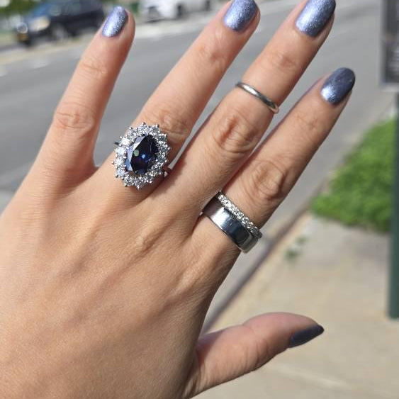 Customer photo of an Orbion oval halo ring, reviewed by Janice on Etsy
