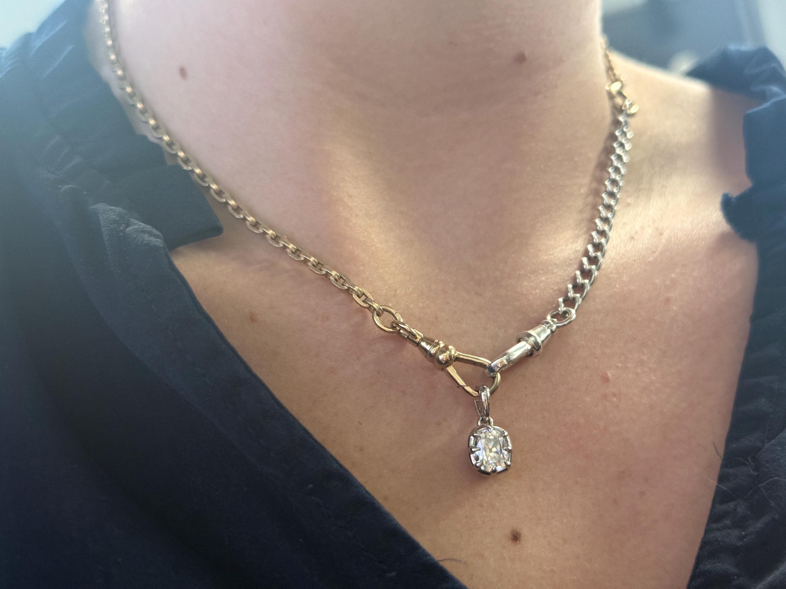 Customer photo of an Orbion vintage-style pendant, reviewed by Victoria on Etsy